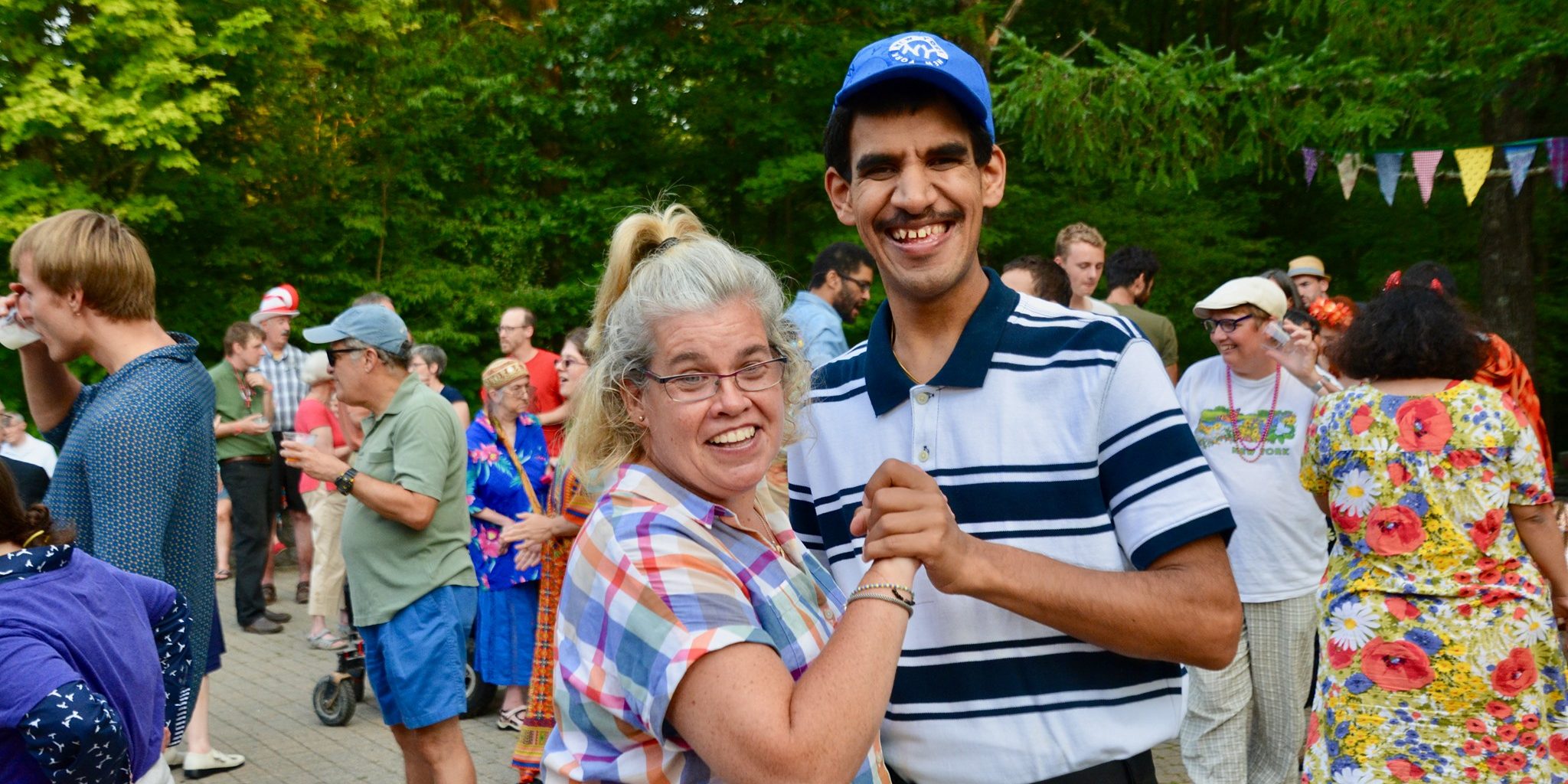 People dancing together at a Camphill festival
