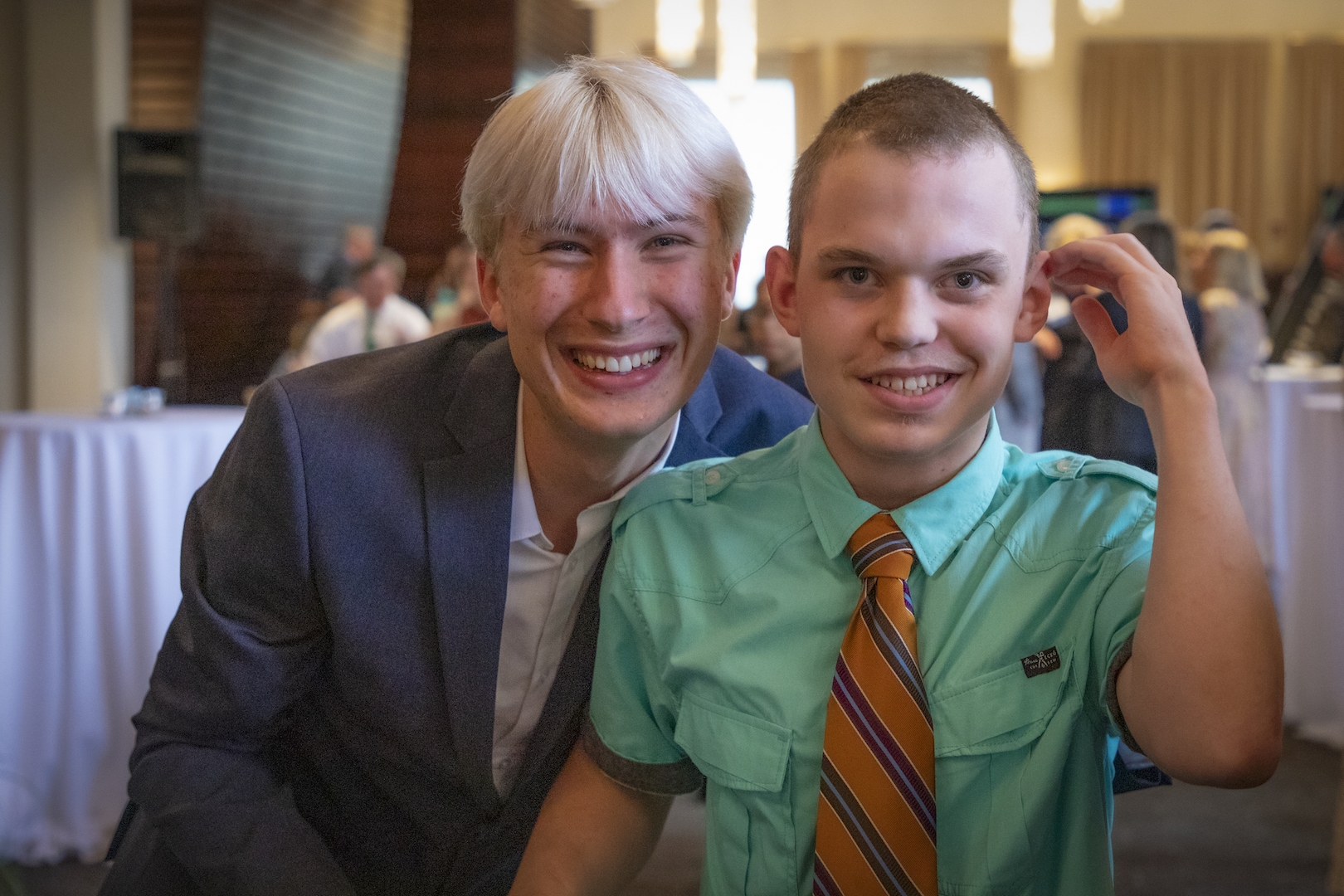 Two people smiling for the camera together