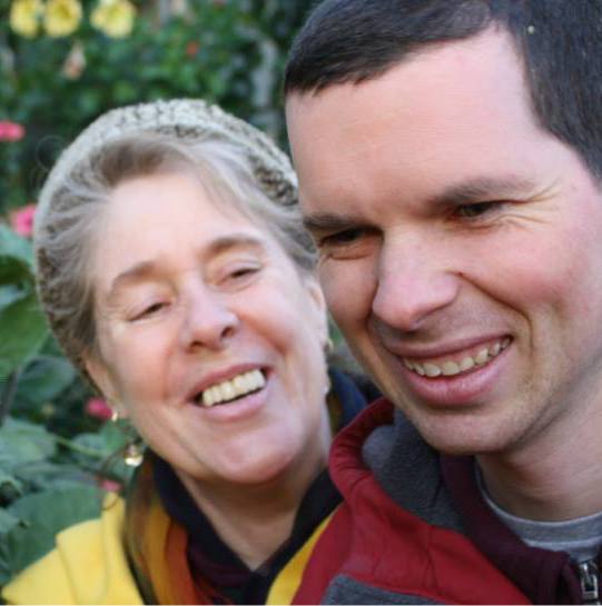 Two people smiling