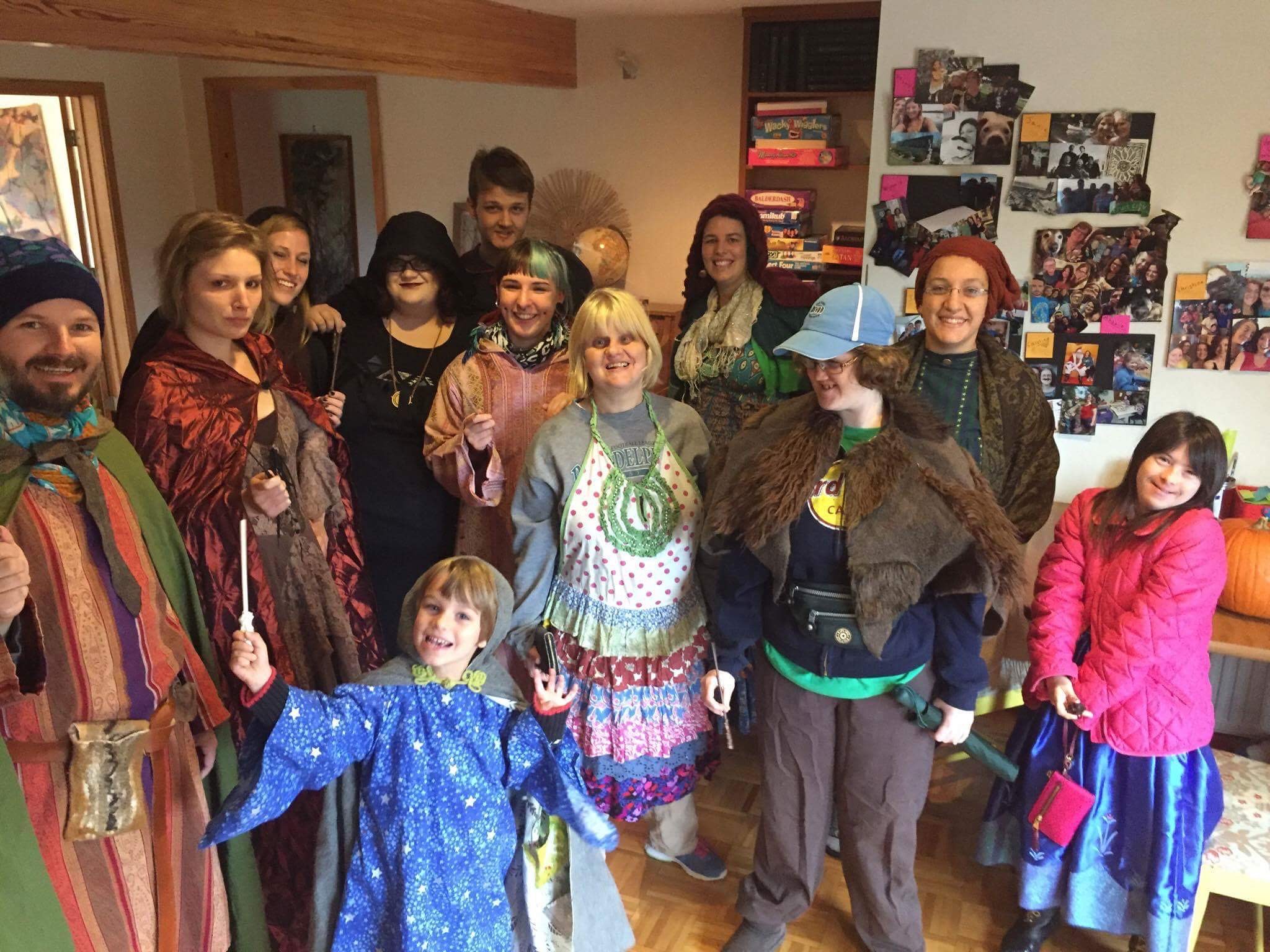 Amy with friends and family on Halloween in Camphill