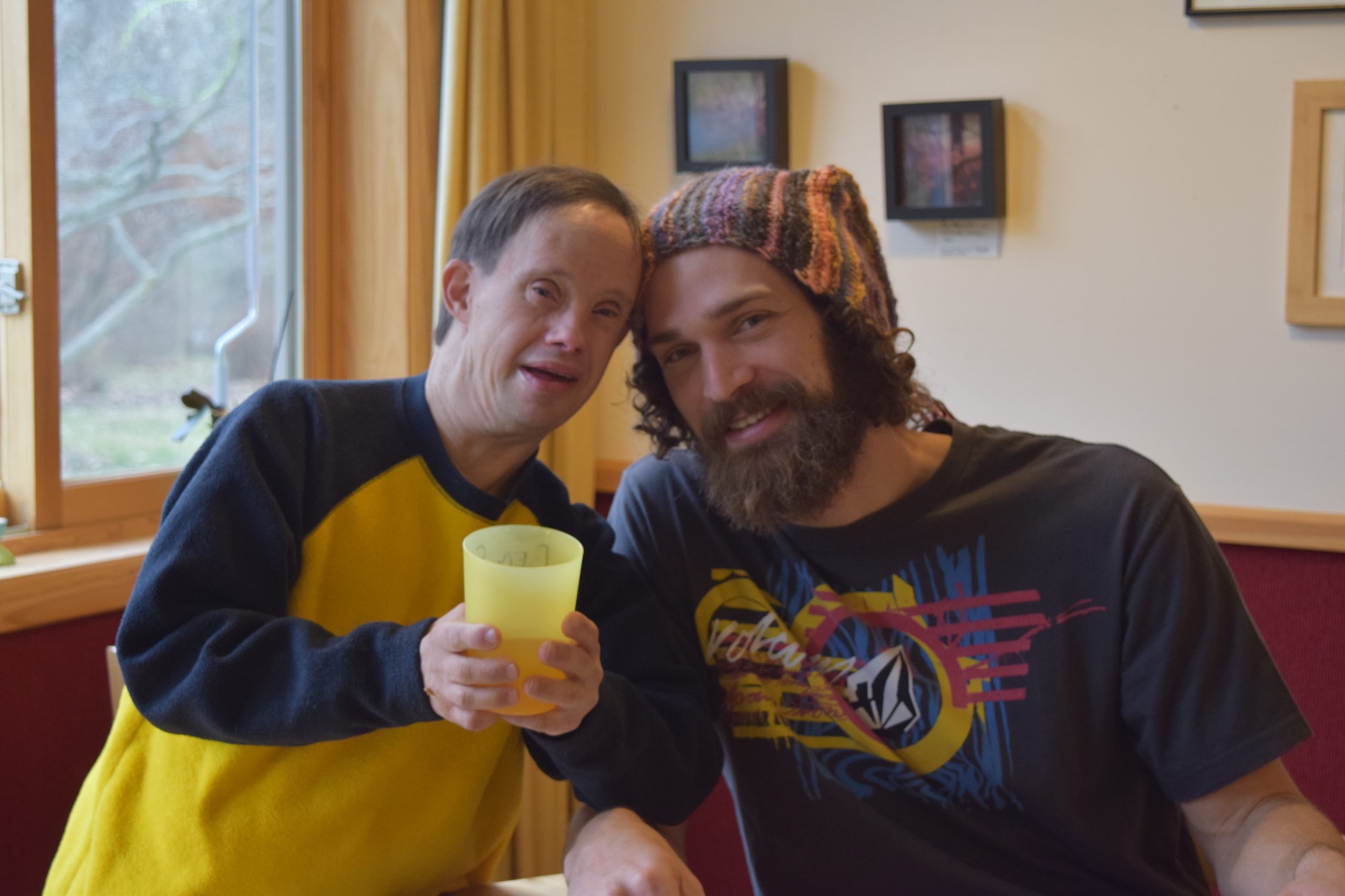 Adam with one of his former Camphill housemates, Ben.