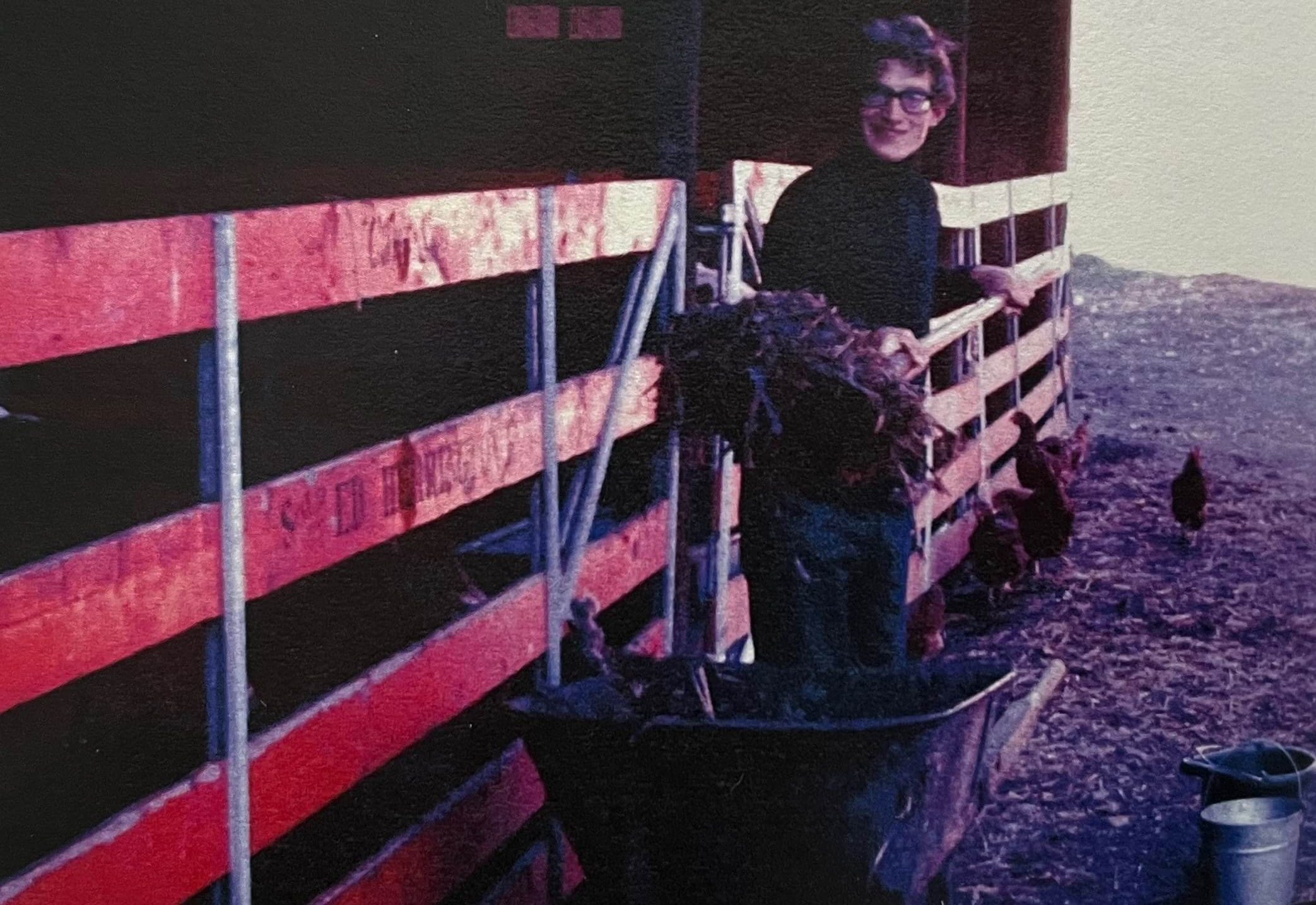Depicting a 31 year old Elias shoveling manure on the Copake farm