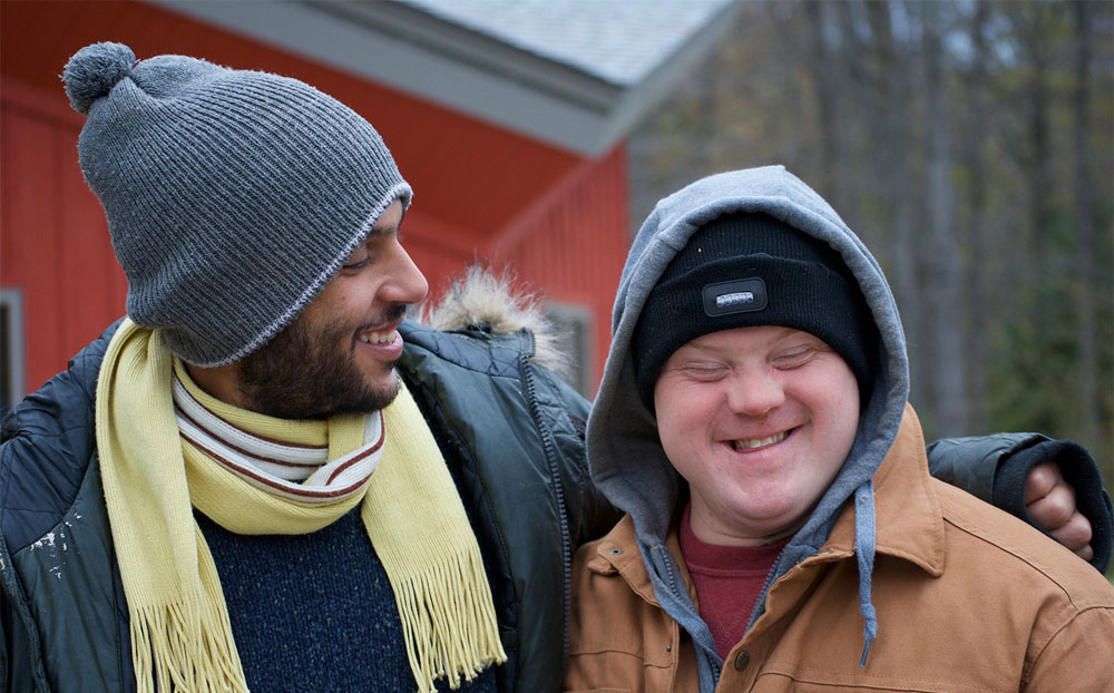 Two people smiling together
