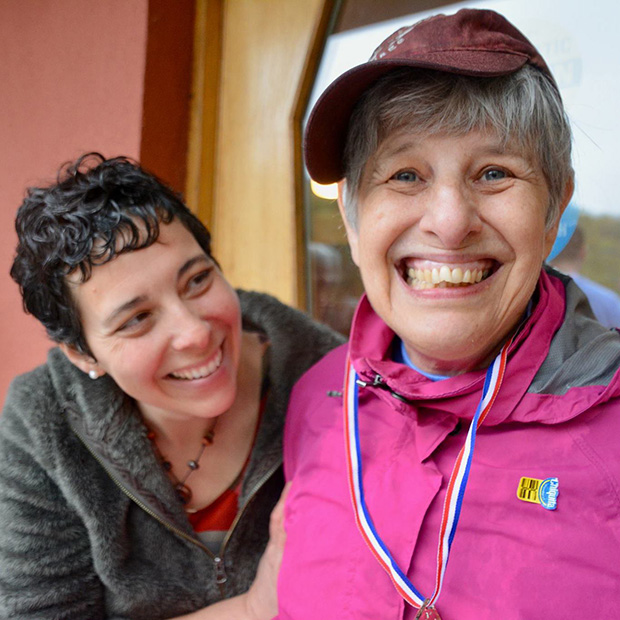 Two people smiling