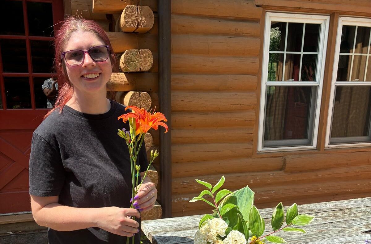 Filling a vase with flowers